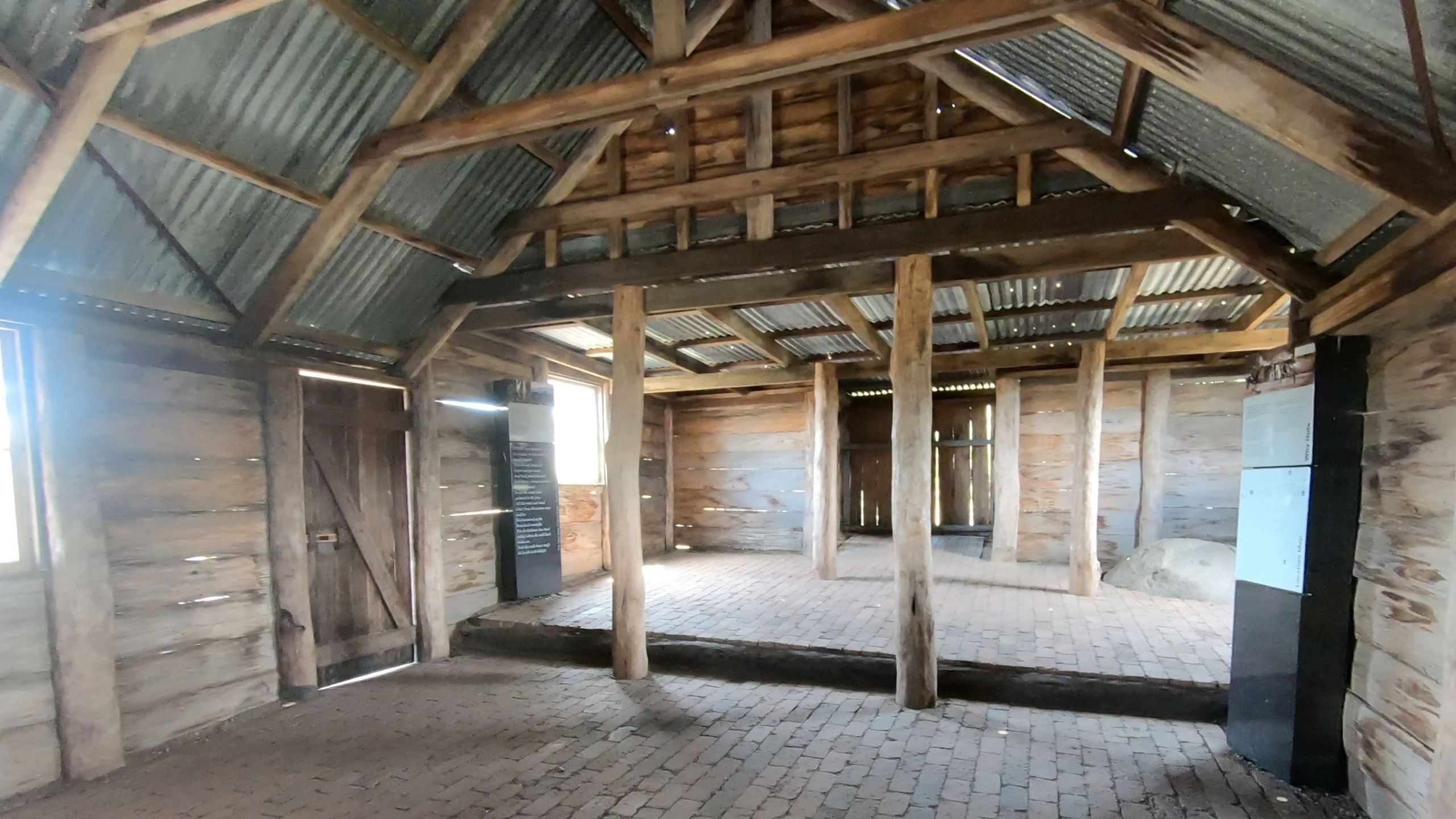 Inside Craig’s Hut showing the rustic wooden interior, timber beams, and alpine hut design in Victoria’s High Country
