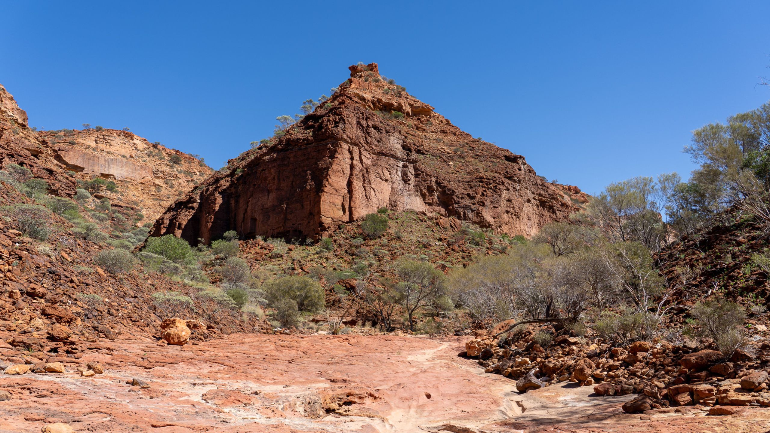 Temple Rock at the end of the Temple Gorge Trail, Kennedy Range National Park, Western Australia -showcasing dramatic red cliffs, unique rock formations, and outback scenery.